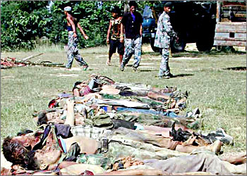 This picture taken, 11 October 2003, shows bodies of alledged Nepalese Maoist rebels lying on the ground at Khas-Kusum in Banke District of Nepalgunj some 415 kms west of Kathmandu. At least 50 Maoist rebels and seven policemen were killed when 600 rebels attacked a police post in Khas-Kusum,during one of the biggest clashes since a seven-month ceasefire ended six weeks ago. More than 8,100 people have died in the Maoist insurgency since 1996 as they demand a communist republic in Nepal. AFPPHOTO