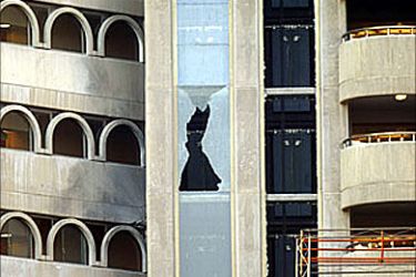 F/Picture shows the shattered glass front of the elevators shaft of Baghdad's Sheraton
