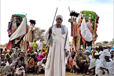 REUTERS/ Musa Hilal, an Arab tribal chief accused by the United States of leading a dreaded militia in Darfur, addresses a crowd of villagers at his north Darfur home area in Mistiriyha, Sudan,