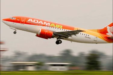 afp - Undated file picture downloaded on Adam Air company website showing an Indonesian Adam Air Boeing 737 airliner taking off