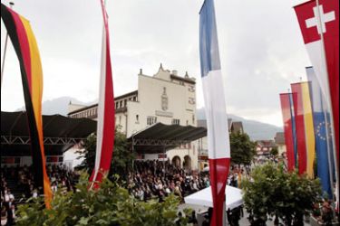 epa00770622 Flags from different European countries wave during the celebrations of the 200-year anniversary of Liechtenstein's sovereignty on the town hall square in Vaduz, Liechtenstein, Wednesday, 12 July 2006