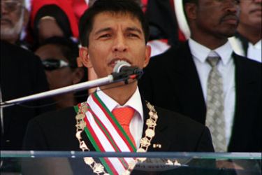 afp : Andry Rajoelina speaks to a crowd of thousands during a ceremony where he was officially invested as transitional president of Madagasar at Antananarivo's stadium on March