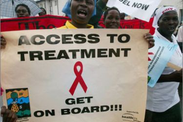 A file picture shows Zimbabwean women's pressure groups as they march in Harare on December 1, 2005 to mark World AIDS Day