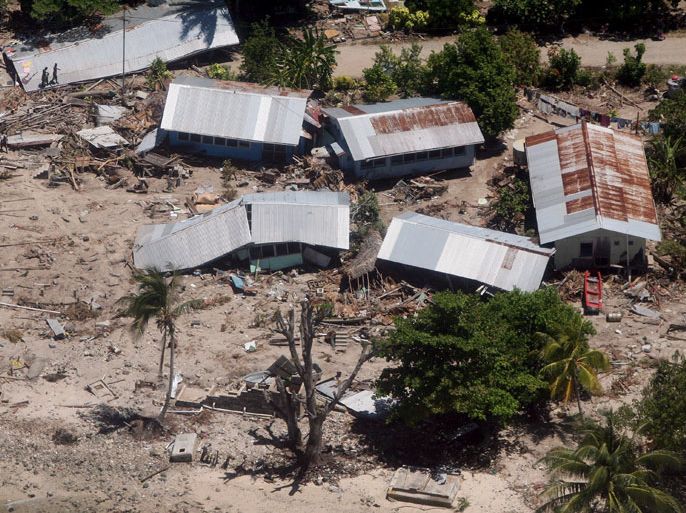 epa01980096 (File) A file photograph dated 05 April 2007, shows an a Aerial view of houses destroyed by an earthquake and subsequent tsunami in the Gizo island, Solomn Islands. A tsunami following two powerful earthquakes left about 500 people homeless in the Solomon Islands, which has been racked by a series of shakes in the last two days, according to reports from the north Pacific state on 05 January. One village on the island of Rendova, which suffered massive landslides, was wiped out and a number of houses destroyed or damaged, Julian Makaa, of the disaster management office, told Radio New Zealand. He said there had been no reports of casualties. EPA/FRANCK ROBICHON