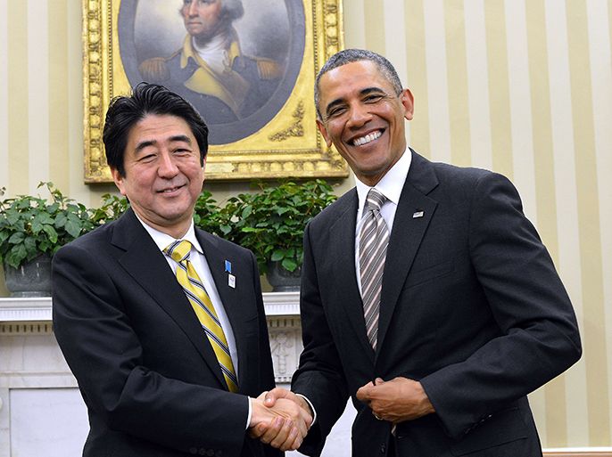 US President Barack Obama shakes hands wtih Japan's new conservative Prime Minister Shinzo Abe following their bilateral meeting in the Oval Office at the White House in Washington on February 22, 2013. AFP PHOTO/Jewel Samad