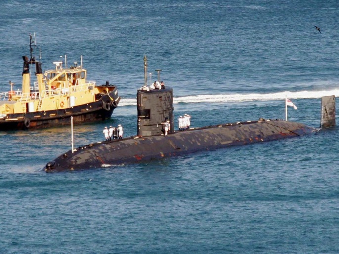 (FILE) The British submarine HMS Tireless docks in the British enclave of Gibraltar on Spain's southernmost tip, 09 July 2004. The British nuclear submarine is set to join the search in the Indian Ocean for the missing Malaysian flight MH370. The submarine HMS Tireless is in the southern Indian Ocean and will join up with the British navy survey vessel HMS Echo. Both ships carry advanced underwater search capabilities and will hunt for the electronic ping emitted by the planes black box.