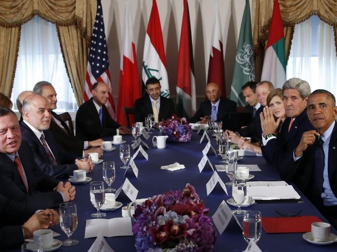 U.S. President Barack Obama meets in New York with representatives of the five Arab nations that contributed in air strikes against Islamic State targets in Syria, September 23, 2014. Also pictured are U.S. Secretary of State John Kerry, Jordan's King Abdullah and Iraqi Prime Minister Haider al-Abadi. The United States and its Arab allies bombed Syria for the first time on Tuesday, killing scores of Islamic State fighters and members of a separate al Qaeda-linked group, opening a new front against militants by joining Syria's three-year-old civil war. REUTERS/Kevin Lamarque (UNITED STATES - Tags: POLITICS CONFLICT MILITARY CIVIL UNREST TPX IMAGES OF THE DAY)