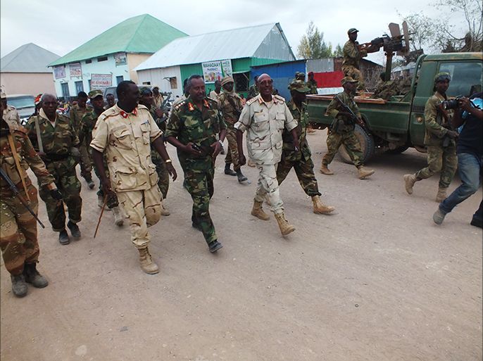 ضباط وجنود من الجيش الصومالي لدى السيطرة على مدينة جالالقسي بوسط الصومال 3 سبتمبر 2014 (الجزيرة نت).