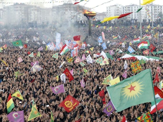 Supporters of Kurdistan Workers' Party (PKK ) gather during a rally as part of Nowruz, or Kurdish New Year, celebrations in Diyarbakir, Turkey, 21 March 2015. Nowruz, which means 'new day' in Kurdish, marks the arrival of spring. The jailed leader of the separatist Kurdistan Workers Party (PKK), Abdullah Ocalan, called PKK to convene congress to discuss laying down arms.