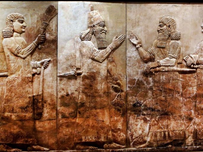 This Monday, Sept. 15, 2014 photo shows, bas-relief displayed at the Iraqi National Museum in Baghdad. For more than 5,000 years, numerous civilizations have left their mark on upper Mesopotamia _ from Assyrians and Akkadians to Babylonians and Romans. Their ancient, buried cities, palaces and temples packed with monumental art are scattered across what is now northern Iraq and eastern Syria. Now much of that archaeological wealth is under the control of extremists from the Islamic State group. They have already destroyed some of that heritage in their zealotry to uproot what they see as heresy. (AP Photo/Hadi Mizban)