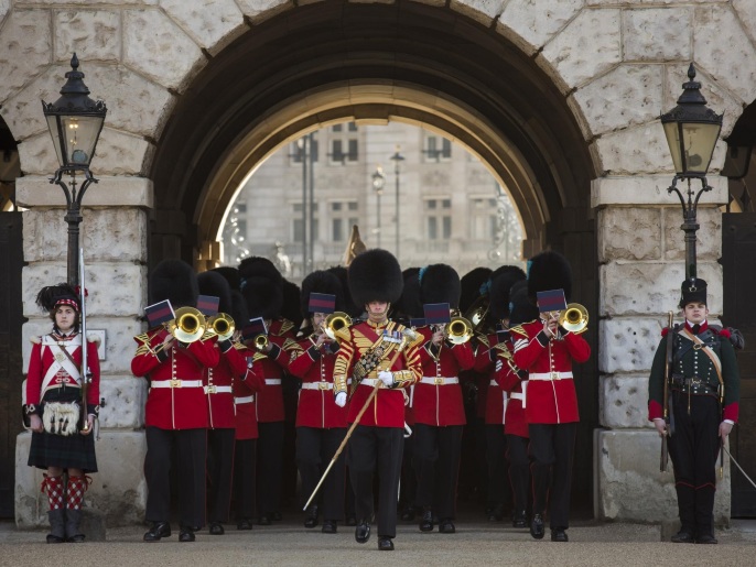 LONDON, ENGLAND - MARCH 23: The Irish Guards march onto Horse Guards Parade during the official launch of this summer's Beating Retreat on March 23, 2015 in London, England. An original Waterloo Bugle, recovered from the battlefield alongside a Drummer and his book of bugle calls, will be played for the first time in 200 years during the summer concert, held on the 10th and 11th of June to commemorate the 200th anniversary of the Battle of Waterloo.