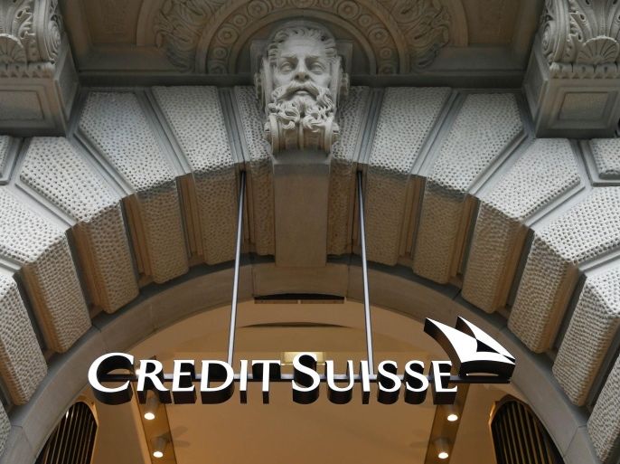 The logo of Swiss bank Credit Suisse is seen at the company's headquarters in Zurich February 12, 2015. Credit Suisse has outlined measures to deal with the strong Swiss franc, as it took an axe to its balance-sheet after posting fourth-quarter net profit ahead of analysts' estimates. Like many big Swiss companies, Credit Suisse holds a considerable portion of its assets in euros, dollars and other currencies, but reports in francs, raising its exposure to exchange rate movements following the franc's surge last month. REUTERS/Arnd Wiegmann (SWITZERLAND - Tags: BUSINESS LOGO)