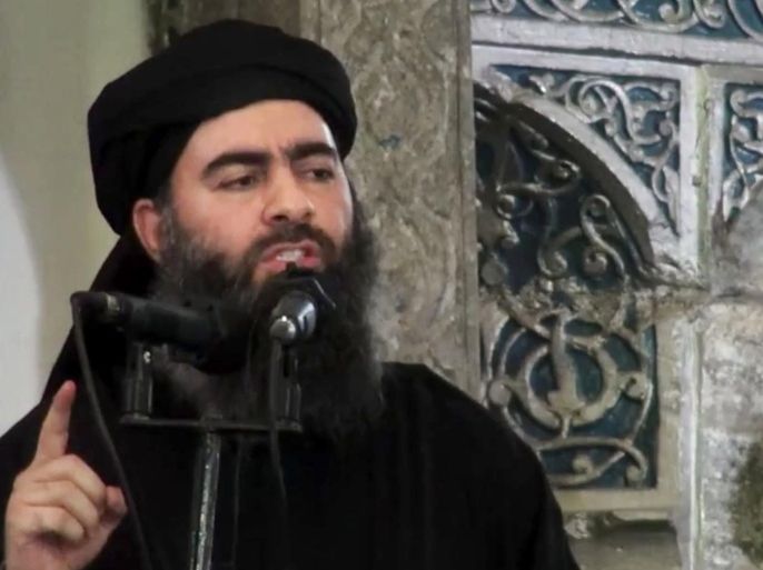 FILE - This file image made from video posted on a militant website Saturday, July 5, 2014, which has been authenticated based on its contents and other AP reporting, purports to show the leader of the Islamic State group, Abu Bakr al-Baghdadi, delivering a sermon at a mosque in Iraq during his first public appearance. An online image released Wednesday purported to show the Islamic State affiliate in Egypt had beheaded a Croatian hostage. (AP Photo/Militant video, File)