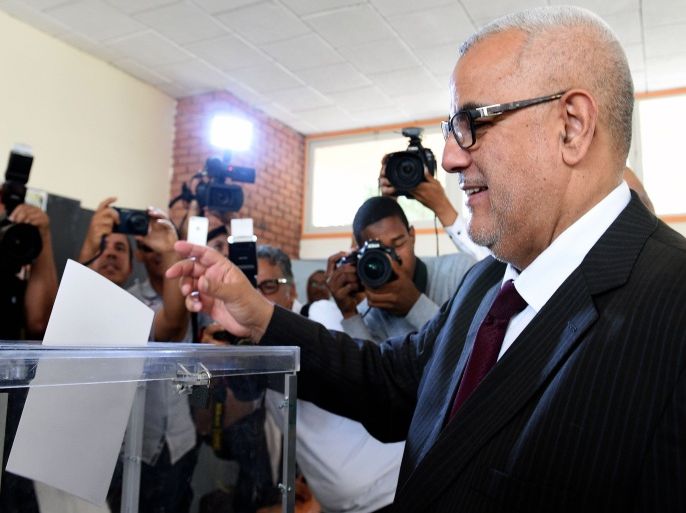 FS2925 - Rabat, -, MOROCCO : Prime Minister and Secretary General of the Islamist Justice and Development Party (PJD), Abdelilah Benkirane, casts his vote in the local elections at a polling station in the centre of the Moroccan capital Rabat on September 4, 2015. Some 15 million Moroccans are heading to the polls for the local elections seen as a gauge of the popularity of the government of Abdelilah Benkirane a year ahead of a general election. AFP PHOTO / FADEL SENNA