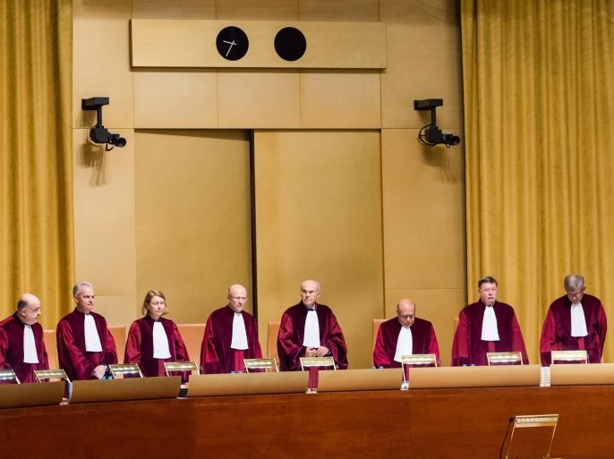 Judges preside over a case at the European Court of Justice in Luxembourg on Tuesday, Oct. 6, 2015. Europe's highest court has ruled in favor of an Austrian law student who claims a trans-Atlantic data protection agreement doesn't adequately protect consumers. (Geert Vanden Wijngaert)