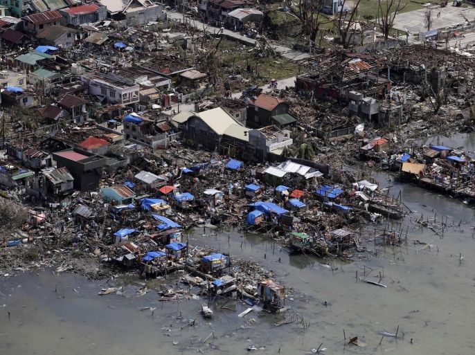 An aerial view of the super typhoon devastated town of Guiuan, eastern Samar province, Philippines, 11 November 2013. Philippine authorities on 11 November, appealed for calm after one of the worlds strongest typhoons left survivors desperate for food and water in areas affected by the storm. More aid workers and relief supplies were being poured into eastern provinces hit by Typhoon Haiyan, which aid agencies and officials estimate has left thousands dead, and staggering destruction in its wake. Thousands were feared dead in Leyte and nearby Samar province, as police and disaster relief officials said that at least 552 were confirmed killed, mostly drowned by tsunami-like sea waves that flattened towns.