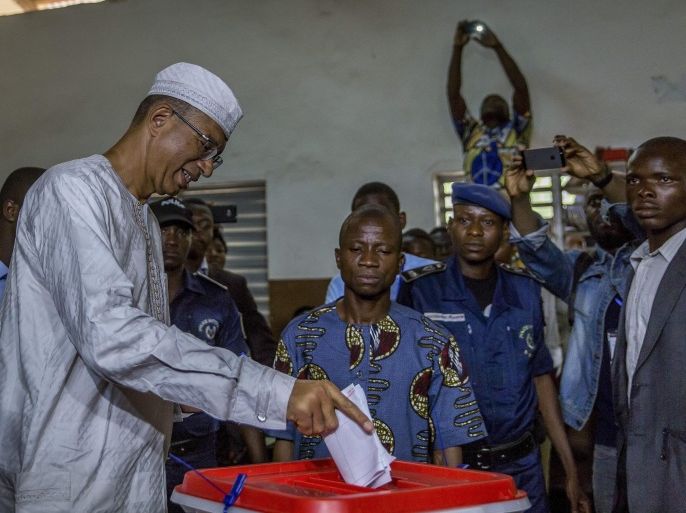 Benin presidential candidate Lionel Zinsou (L) casts his ballot in the Benin presidential elections in Cotonou, Benin, 06 March 2016. About 4.6 million voters will have the choice between a record 33 presidential candidates. The front-runner is Prime Minister Lionel Zinsou, 61, though some voters may hold his French connections against him. Other top candidates include cotton magnate Patrice Talon, regarded by many as Benin's richest man; businessman Sebastien Alavon, who made his fortune in the food industry; former premier Pascal Koupaki; and Abdoulaye Bio Tchane, a former Africa director of the International Monetary Fund. The race was expected to be one of the tightest ever in Benin, which is regarded as one of Africa's most solid democracies.