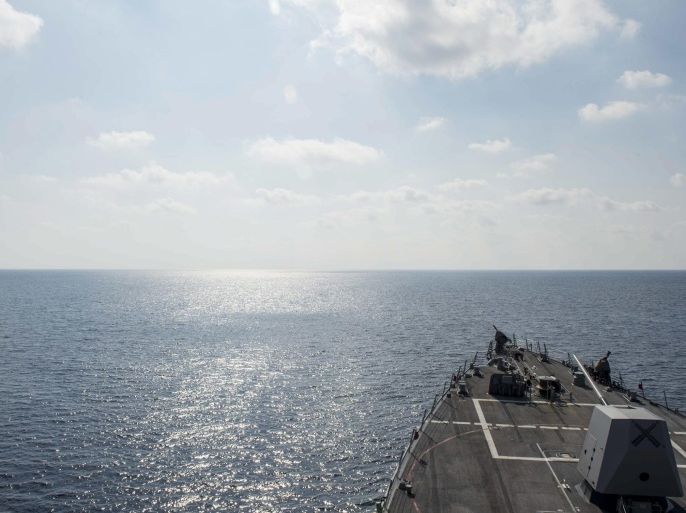 A handout picture made available by the US Ministry of Defense (MOD) on 10 May 2016 shows the guided-missile destroyer USS William P. Lawrence (DDG 110) conducting a routine patrol in international waters in the South China Sea, 02 May 2016, in the 7th Fleet Area of Operations in support of security and stability in the Indo-Asia-Pacific. The vessel has been reported on 10 May 2016, to have conducted a 'routine freedom of navigation operation' sailing near Fiery Cross Reef, in disputed waters in the South China Sea which are claimed by China, the Philippines, Taiwan and Vietnam. EPA/US NAVY/EMILINE L. M. SENN