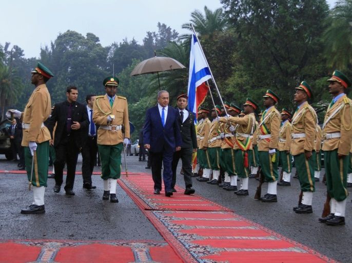 Israeli Prime Minister Benjamin Netanyahu inspects a guard of honor at the National Palace during his State visit to Addis Ababa, Ethiopia, July 7, 2016. REUTERS/Tiksa Negeri