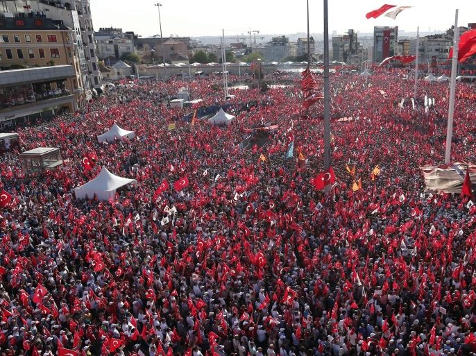 Supporters of main opposition Republic Public Party (CHP) shout slogans and hold Turkish flags and pictures of Ataturk, founder of modern Turkey, during a demonstration against coup at Taksim Square, in Istanbul, Turkey, 24 July 2016. Turkish parliament on 21 July formally approved a three-month state of emergency declared by Turkish President Erdogan. The 15 June's failed coup attempt's aftermath was followed by the dismissal of 50,000 workers and the arrest of 8,000