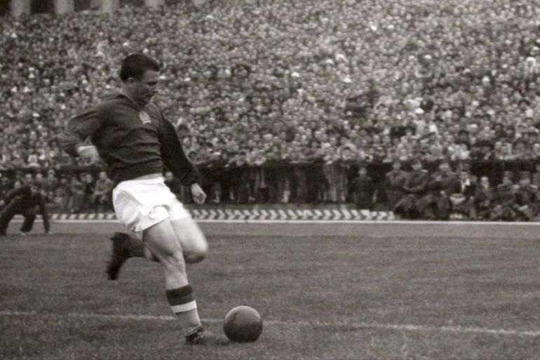 epa00864573 (FILES) A file photograph showing Ferenc Puskas of the Hungarian National soccer team scoring against Scotland during their international match played in Budapest , 29 May 1955. Soccer legend Ferenc Puskas of Budapest Honved and Real Madrid, striker of the so-called Golden Team of the 1950s died after a long and serius illness at the age 79 in Budapest, Friday 17 November 2006 at the Kutvolgyi hospital where he had been hospitalized for six years with Alzhei