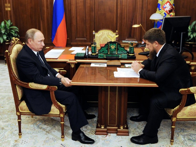 Russian President Vladimir Putin (L) meets with Chechnya's leader Ramzan Kadyrov at the Kremlin in Moscow, Russia, August 25, 2016. Picture taken August 25, 2016. Sputnik/Kremlin/Mikhail Klimentyev/via REUTERS ATTENTION EDITORS - THIS IMAGE WAS PROVIDED BY A THIRD PARTY. EDITORIAL USE ONLY.