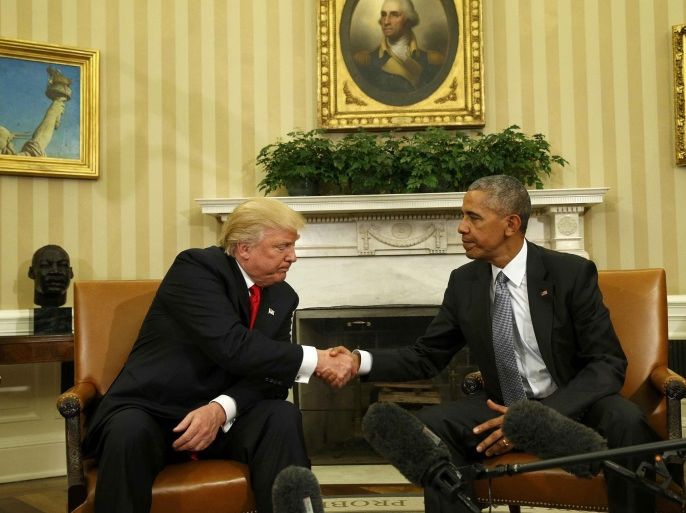U.S. President Barack Obama shakes hands with President-elect Donald Trump (L) to discuss transition plans in the White House Oval Office in Washington, U.S., November 10, 2016. REUTERS/Kevin Lamarque