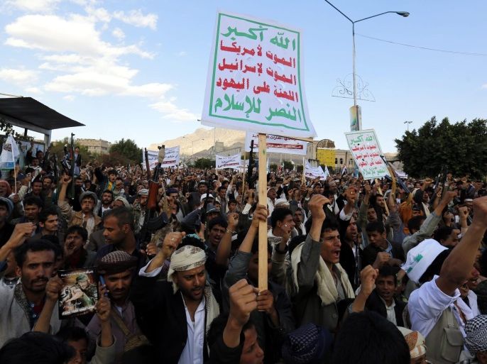 Houthi supporters hold up banners reading in Arabic 'Allah is the greatest of all, Death to America, Death to Israel, A curse on the Jews, Victory to Islam' during a rally protesting against the US support for the Saudi-led military offensive in the war-torn country, in Sana'a, Yemen, 01 March 2016. According to reports, thousands of Houthi supporters took to the streets of Sana'a to protest against the US support for the Saudi-led military coalition fighting Houthi rebels and allied army forces in order to restore the internationally recognized government of Yemeni President Abdo Rabbo Mansour Hadi. EPA/YAHYA ARHAB