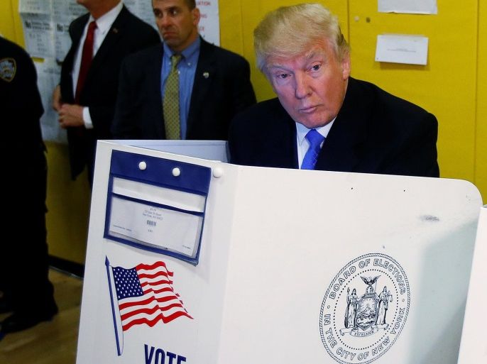 Republican presidential nominee Donald Trump votes at PS 59 in New York, New York, U.S. November 8, 2016. REUTERS/Carlo Allegri