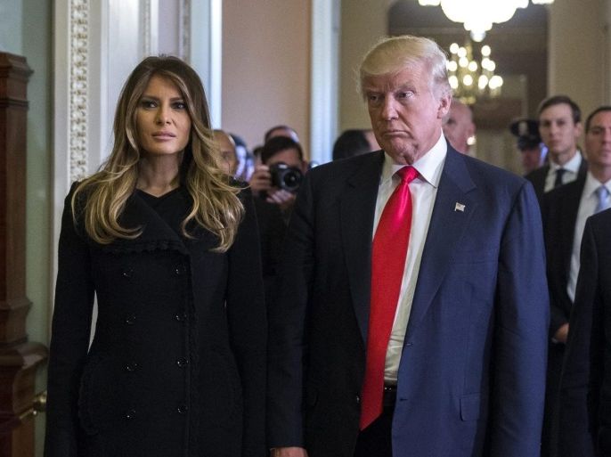 US President elect Donald Trump (C), with his wife Melania Trump (L), and Senate Majority Leader Mitch McConnell (R), listens to a question from the news media after a meeting in the Majority Leaders office in the US Capitol in Washington, DC, USA, 10 November 2016. Earlier in the day, President elect Trump met with US President Barack Obama and Speaker of the House Paul Ryan.