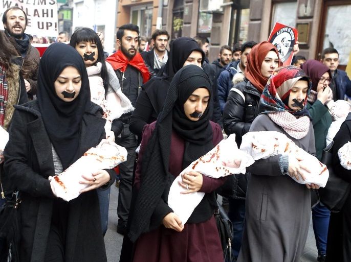 Turk, Arab and Bosnian people carry effigies representing dead babies during a solidarity march in Sarajevo, Bosnia and Herzegovina, 14 December 2016. The march is to show solidarity with trapped citizens of Aleppo in Syria. Russia's Ambassador to the UN announced that the Syrian government's army has on 13 December taken full control over the city of Aleppo.