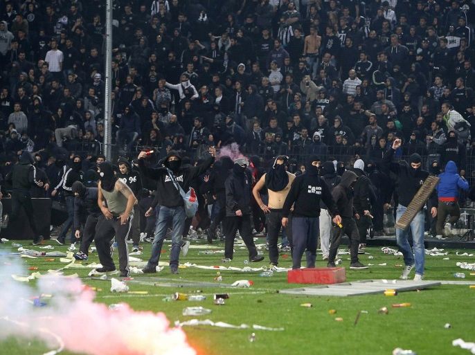 A photo made available on 03 March shows shows PAOK supporters during riots that broke during the soccer match PAOK vs Olympiacos in Thessaloniki, north Greece, on 02 March 2016. Deputy Minister for Sports, Stavros Kontonis, called off on 03 March 2016 the Greek Cup for the 2016 period, citing numerous violent incidents that have plagued recent matches between football clubs.