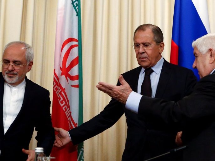 Russian Foreign Minister Sergei Lavrov (C) and his counterparts Walid al-Muallem (R) from Syria and Mohammad Javad Zarif from Iran attend a news conference in Moscow, Russia, October 28, 2016. REUTERS/Sergei Karpukhin