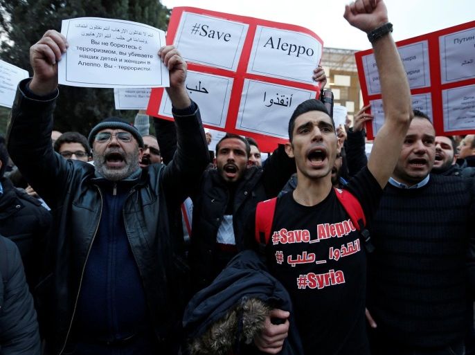 Protesters chant slogans during a sit-in, in solidarity with the people of Aleppo and against Russia's support of the Syrian regime, in front of the Russian embassy in Amman, Jordan, December 13, 2016. REUTERS/Muhammad Hamed