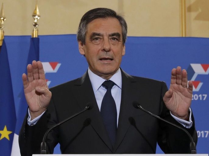 Francois Fillon, former French prime minister and member of Les Republicains political party, reacts as he delivers his speech after partial results in the second round for the French center-right presidential primary election in Paris, France, November 27, 2016. Fillon, a socially conservative free-marketeer, is to be the presidential candidate of the French centre-right in next year's election, according to partial results of a primaries' second-round vote showed on Sunday. REUTERS/Christian Hartmann