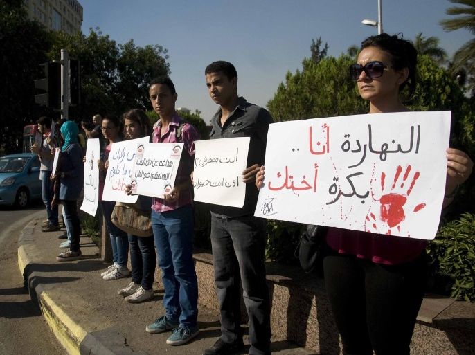 Egyptian protesters hold banners against sexual harassment during a gathering in Cairo, Egypt, 14 June 2014. At least five cases of sexual assault were reported on 08 June while thousands were celebrating al-Sissi's inauguration in central Cairo's Tahrir Square. A law stipulating harsher punishments for sexual harassment - including between six months and five years in prison was passed last week after a graphic video of a naked woman circulated online. EPA/NAMEER GALAL/ALMASRY ALYOUM EGYPT OUT *** Local Caption *** 51309221 *** Local Caption *** 51309221