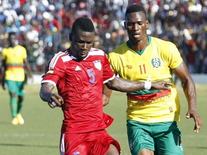 Guinea Bissau striker, Matado Rald Amiclo (R) against the Liberia defence during a FIFA World Cup 2018 qualifier soccer match between Liberia and Guinea Bissau, at the Antoinette Tubman stadium in Monrovia, Liberia, 08 October 2015.