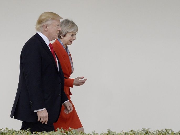 US President Donald J. Trump and British Prime Minister Theresa May walk the colonade of the White House in Washington, DC, USA, 27 January 2017.
