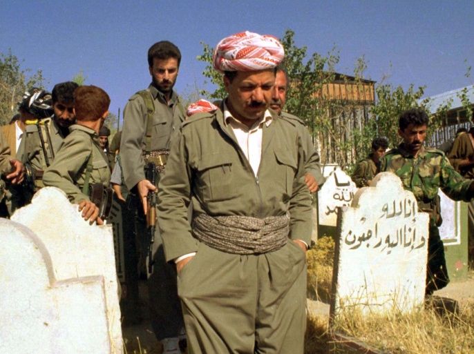 Iraqi Kurdish faction Kurdistan Democratic Party (KDP) leader Massoud Barzani thoughtfully walks through the martyrs cemetery in Sulaimaniya September 10 after this northern Iraqi town was captured by the KDP troops and ousted rival Kurdish faction PUK supporters. KDP leader Barzani has issued an amnesty to Talabani's Patriotic Union of Kurdistan (PUK) forces and said new elections must be organised as soon as Talabani admits defeat.