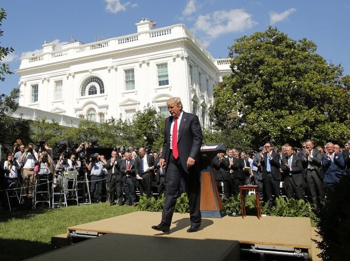 U.S. President Donald Trump departs after announcing his decision that the United States will withdraw from the landmark Paris Climate Agreement, in the Rose Garden of the White House in Washington, U.S., June 1, 2017. REUTERS/Kevin Lamarque
