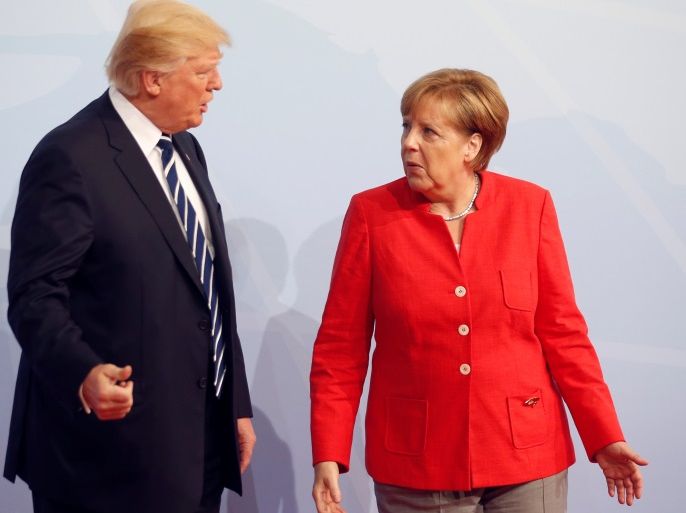 German Chancellor Angela Merkel welcomes U.S. President Donald Trump at the G20 leaders summit in Hamburg, Germany July 7, 2017. REUTERS/Axel Schmidt