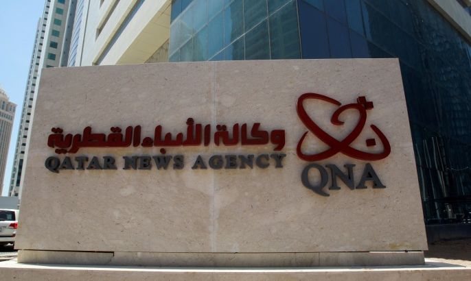 A signboard of Qatar News Agency is seen in Doha, Qatar, June 5, 2017. REUTERS/Stringer