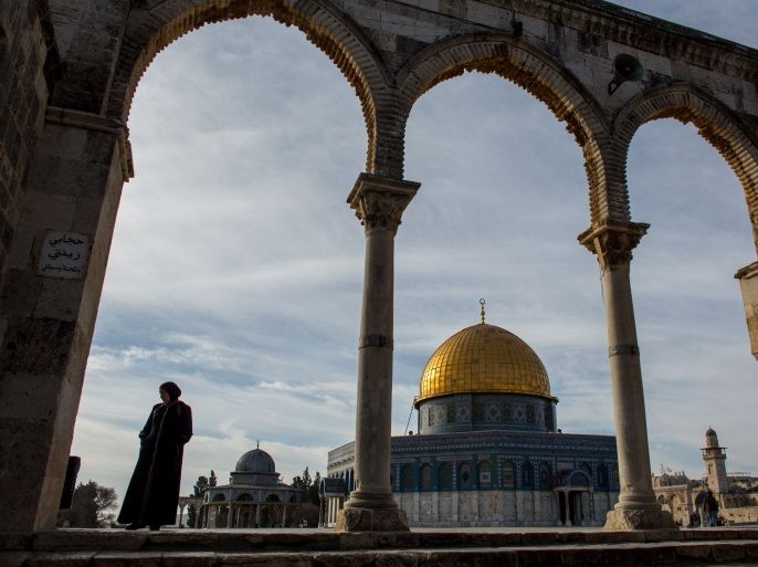 JERUSALEM, ISRAEL - JANUARY 17: A woman stands in front of the Dome of the Rock at the Al-Aqsa mosque compound in the Old City on January 17, 2017 in Jerusalem, Israel. 70 countries attended the recent Paris Peace Summit and called on Israel and Palestinians to resume negotiations that would lead to a two-state solution, however the recent proposal by U.S President-elect Donald Trump to move the US embassy from Tel Aviv to Jerusalem and last month's U.N. Security Council resolution condemning Jewish settlement activity in the West Bank have contributed to continued uncertainty across the region. The ancient city of Jerusalem where Jews, Christians and Muslims have lived side by side for thousands of years and is home to the Al Aqsa Mosque compound or for Jews The Temple Mount, continues to be a focus as both Israelis and Palestinians claim the city as their capital. The Israeli-Palestinian conflict has continued since 1947 when Resolution 181 was passed by the United Nations, dividing Palestinian territories into Jewish and Arab states. The Israeli settlement program has continued to cause tension as new settlements continue to encroach on land within the Palestinian territories. The remaining Palestinian territory is made up of the West Bank and the Gaza strip. (Photo by Chris McGrath/Getty Images)