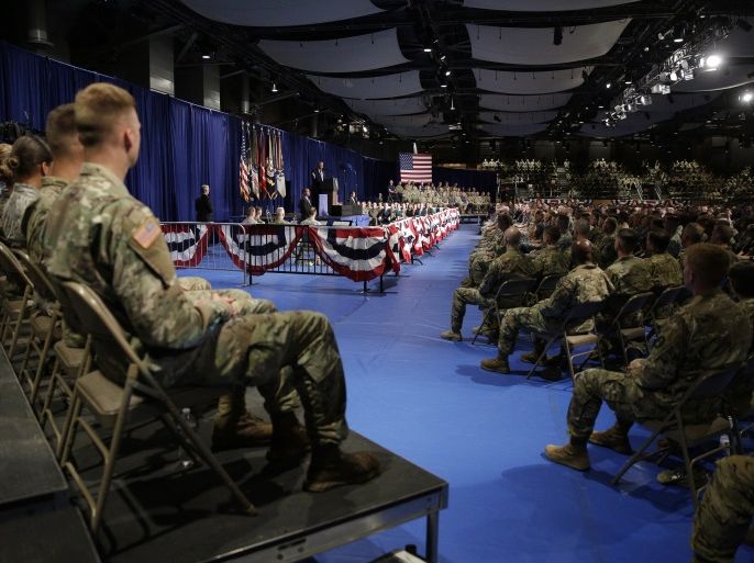 Members of the U.S. military listen as U.S. President Donald Trump announces his strategy for the war in Afghanistan during an address to the nation from Fort Myer, Virginia, U.S., August 21, 2017. REUTERS/Joshua Roberts