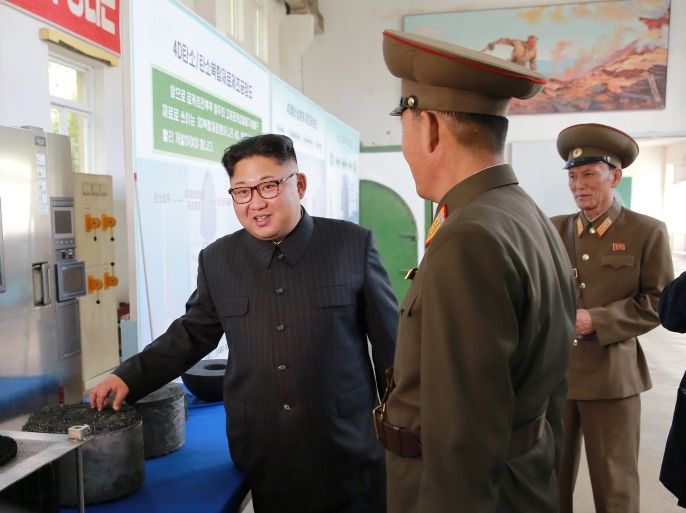 North Korean leader Kim Jong-Un gives field guidance during a visit to the Chemical Material Institute of the Academy of Defense Science in this undated photo released by North Korea's Korean Central News Agency (KCNA) in Pyongyang on August 23, 2017. KCNA/via REUTERS ATTENTION EDITORS - THIS PICTURE WAS PROVIDED BY A THIRD PARTY. REUTERS IS UNABLE TO INDEPENDENTLY VERIFY THE AUTHENTICITY, CONTENT, LOCATION OR DATE OF THIS IMAGE. FOR EDITORIAL USE ONLY. NOT FOR SALE FOR MARKETING OR ADVERTISING CAMPAIGNS. NO THIRD PARTY SALES. NOT FOR USE BY REUTERS THIRD PARTY DISTRIBUTORS. SOUTH KOREA OUT. NO COMMERCIAL OR EDITORIAL SALES IN SOUTH KOREA. THIS PICTURE IS DISTRIBUTED EXACTLY AS RECEIVED BY REUTERS, AS A SERVICE TO CLIENTS.