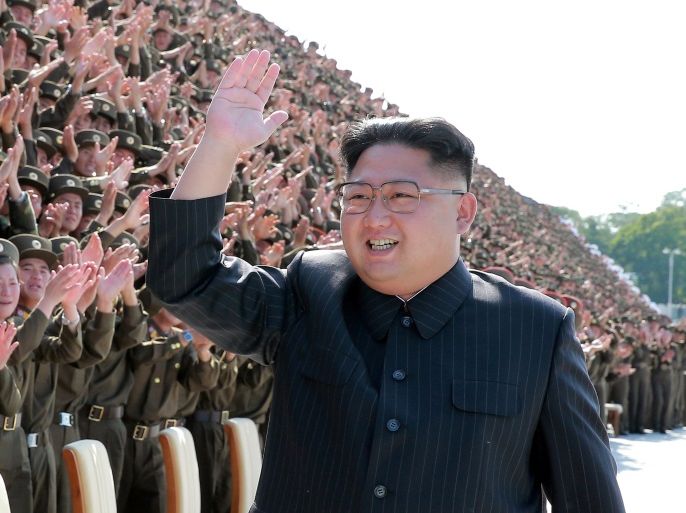 North Korean leader Kim Jong Un waves at a photo session with attendants in the fourth Active Secretaries of Primary Organization of KPA Youth in this undated photo released by North Korea's Korean Central News Agency (KCNA) in Pyongyang September 1, 2017. KCNA via REUTERS ATTENTION EDITORS - THIS PICTURE WAS PROVIDED BY A THIRD PARTY. REUTERS IS UNABLE TO INDEPENDENTLY VERIFY THE AUTHENTICITY, CONTENT, LOCATION OR DATE OF THIS IMAGE. NOT FOR SALE FOR MARKETING OR ADVERTISING CAMPAIGNS. NO THIRD PARTY SALES. NOT FOR USE BY REUTERS THIRD PARTY DISTRIBUTORS. SOUTH KOREA OUT. NO COMMERCIAL OR EDITORIAL SALES IN SOUTH KOREA. THIS PICTURE IS DISTRIBUTED EXACTLY AS RECEIVED BY REUTERS, AS A SERVICE TO CLIENTS. TPX IMAGES OF THE DAY