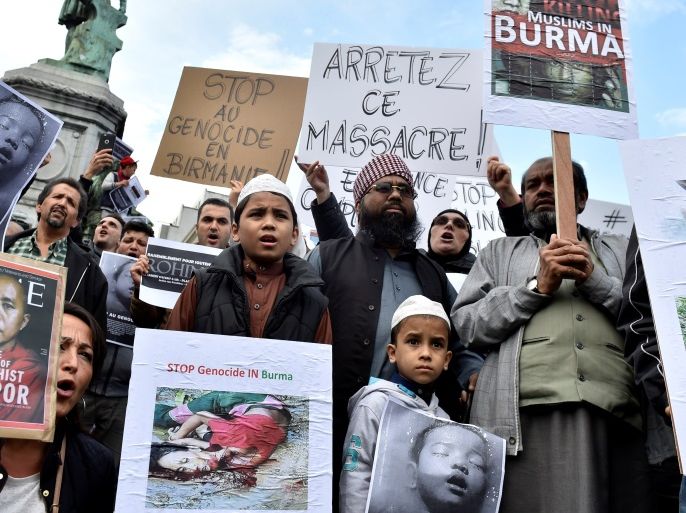 People demonstrate against the situation of the Rohingyas in Burma showing signs reading