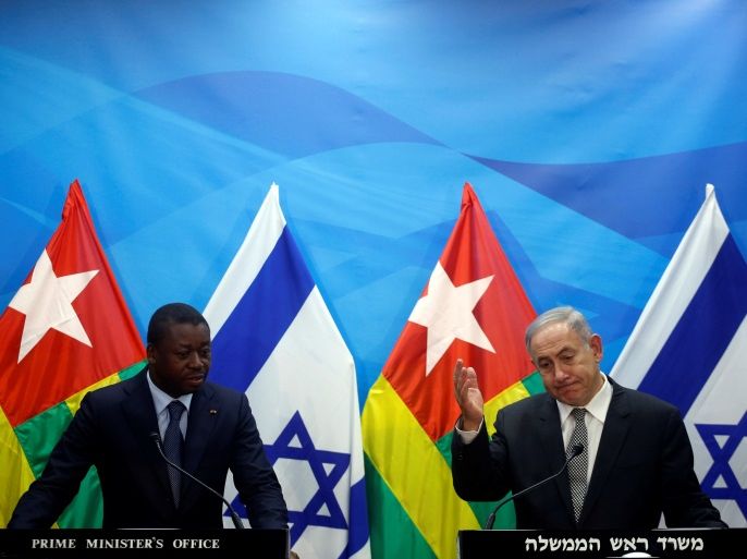 Israeli Prime Minister Benjamin Netanyahu (R) speaks during a joint statement with Togo's President Faure Gnassingbe in Jerusalem August 10, 2016. REUTERS/Ronen Zvulun