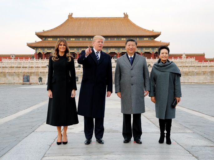 U.S. President Donald Trump and U.S. first lady Melania visit the Forbidden City with ChinaÕs President Xi Jinping and ChinaÕs First Lady Peng Liyuan in Beijing, China, November 8, 2017. REUTERS/Jonathan Ernst
