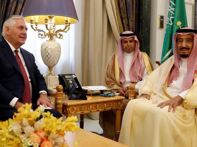 U.S. Secretary of State Rex Tillerson and Saudi King Salman speak before their meeting in Riyadh, Saudi Arabia, October 22, 2017. REUTERS/Alex Brandon/Pool